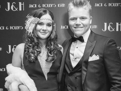 Jack Scott Ramsay is on a tuxedo and Holly Anna Ramsay is wearing a sleeveless dress.